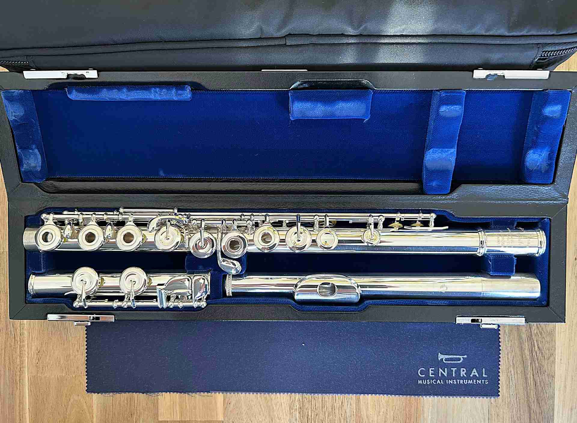 Muramatsu EXIII RCE Flute. Solid silver headjoint with silver plated body and keys. This flute has open holes with offset G, split E and C foot